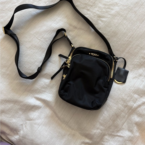 Tumi Black Crossbody Bag with Gold Accents - Picture 2 of 2